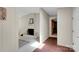 Welcoming foyer and living area featuring a white brick fireplace and neutral decor at 331 Glen Oaks Rd, Charlotte, NC 28270