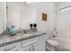 Charming bathroom featuring granite countertops, white cabinetry, a framed mirror, and a shower-tub combo at 333 Dudley Dr, Fort Mill, SC 29715