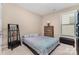 Bedroom featuring soft carpet, a comfortable bed, and plenty of natural light from the window at 333 Dudley Dr, Fort Mill, SC 29715