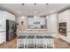 This kitchen features granite countertops, stainless steel appliances, a center island, and pendant lighting at 333 Dudley Dr, Fort Mill, SC 29715
