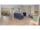 Inviting living room with hardwood floors, a fireplace, and an adjacent dining area at 333 Dudley Dr, Fort Mill, SC 29715