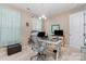 Bright office space includes a desk, chair, and a large window with sheer curtains at 333 Dudley Dr, Fort Mill, SC 29715