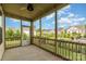 Inviting screened-in porch perfect for relaxing with neighborhood views and an overhead fan at 333 Dudley Dr, Fort Mill, SC 29715