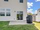 Home exterior featuring a patio, grill, fenced yard, and sliding glass door from the interior at 3615 Slider Ter, Lancaster, SC 29720