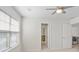 Bright bedroom with a ceiling fan, window, and view into adjacent rooms on the second story at 3615 Slider Ter, Lancaster, SC 29720