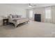Bright bedroom with ample space, natural light, and elegant curtains at 3615 Slider Ter, Lancaster, SC 29720