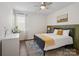 Well-lit bedroom featuring a ceiling fan, stylish rug, and comfortable decor at 3615 Slider Ter, Lancaster, SC 29720
