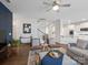 Cozy living room with comfortable seating, a decorative rug, and a view of the staircase at 3615 Slider Ter, Lancaster, SC 29720