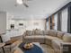 Spacious living room with an oversized sectional, and open view of the kitchen and dining area at 3615 Slider Ter, Lancaster, SC 29720
