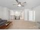 Upstairs common area with a comfortable sofa and modern fixtures under a ceiling fan at 3615 Slider Ter, Lancaster, SC 29720