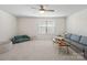 Spacious living room features a modern ceiling fan and comfortable sectional sofa at 3615 Slider Ter, Lancaster, SC 29720