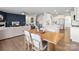 Open-concept living space with a dining table, living room, and kitchen, perfect for entertaining at 3615 Slider Ter, Lancaster, SC 29720