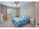 Comfortable bedroom with carpet, ceiling fan, and natural light at 3666 Jacinta Ct, Tega Cay, SC 29708