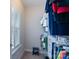 Walk-in closet with custom shelving provides ample storage at 3666 Jacinta Ct, Tega Cay, SC 29708