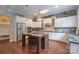 Spacious kitchen with marble island, stainless steel appliances, and white cabinets at 3666 Jacinta Ct, Tega Cay, SC 29708
