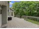 Expansive deck for outdoor entertaining, featuring a well-maintained structure and serene nature views at 4101 Fairway Downs Ct # 9, Charlotte, NC 28277
