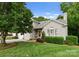 Charming stucco home with a well-maintained front yard and attached two-car garage at 4101 Fairway Downs Ct # 9, Charlotte, NC 28277