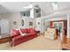 Bright living room with a staircase, open floor plan, and comfortable seating at 4101 Fairway Downs Ct # 9, Charlotte, NC 28277