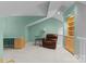 Loft featuring a seating area and built in bookshelf with natural light offering relaxation and functionality at 4101 Fairway Downs Ct # 9, Charlotte, NC 28277