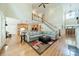 Spacious living room featuring a staircase and an open floor plan at 4319 Sailview Dr, Denver, NC 28037