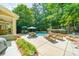Beautiful pool area with lounge chairs, umbrellas, and lush landscaping, perfect for relaxation and entertainment at 4319 Sailview Dr, Denver, NC 28037