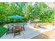 Stunning pool area featuring a waterfall feature, comfortable seating, and lush landscaping at 4319 Sailview Dr, Denver, NC 28037