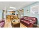 Finished basement living area with a kitchenette and glass patio doors to outside at 4920 Longfield St, Claremont, NC 28610