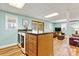 Finished basement featuring an island, laundry area, and a cozy sitting area at 4920 Longfield St, Claremont, NC 28610