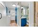 Hallway view of half bath and laundry room at 4920 Longfield St, Claremont, NC 28610