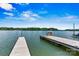 Lakefront dock with a built in bench ready for entertaining at 4920 Longfield St, Claremont, NC 28610