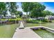 Wooden dock with seating extends into calm lake waters, perfect for relaxing at 4920 Longfield St, Claremont, NC 28610