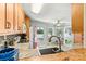 Well-lit kitchen with stainless steel appliances, granite countertops, and a lake view at 4920 Longfield St, Claremont, NC 28610
