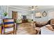 Inviting living room with wood floors, comfortable seating, and a sliding barn door at 4920 Longfield St, Claremont, NC 28610