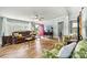 Bright living room featuring hardwood floors, comfortable seating, and a view to the outdoors at 4920 Longfield St, Claremont, NC 28610