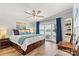 Inviting main bedroom with hardwood floors, waterfront views, and stylish coastal decor at 4920 Longfield St, Claremont, NC 28610
