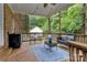 Inviting back deck with outdoor seating, lattice privacy screen and string lights at 511 Apple Ln, Bessemer City, NC 28016