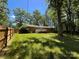 Spacious backyard features a deck and new wood fence for privacy at 511 Evelyn Ave, Kannapolis, NC 28083