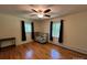 Bright bedroom with hardwood floors, ceiling fan and plenty of natural light at 511 Evelyn Ave, Kannapolis, NC 28083