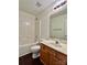 The bathroom features a single sink vanity and a shower-tub combo at 710 Woodington Ln, Charlotte, NC 28214