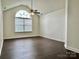 This large bedroom includes high ceilings and a ceiling fan at 710 Woodington Ln, Charlotte, NC 28214
