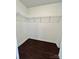 This closet offers ample storage space with wire shelving and sleek flooring at 710 Woodington Ln, Charlotte, NC 28214