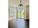 Cozy dining area with a sliding glass door leading to the outside at 710 Woodington Ln, Charlotte, NC 28214