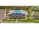 Stunning aerial view of community amenities including pool, clubhouse, tennis court and playground at 724 Little Bluestem Dr, Lake Wylie, SC 29710