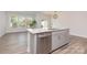 Stylish kitchen island with stainless steel dishwasher, granite countertop, and bar seating at 724 Little Bluestem Dr, Lake Wylie, SC 29710