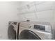 Laundry room featuring new side by side Samsung washer and dryer set at 724 Little Bluestem Dr, Lake Wylie, SC 29710