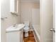 Bathroom with white vanity and sink, toilet, and shower-tub combo at 730 Marble St, Charlotte, NC 28208