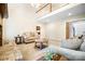 Bright living room featuring neutral tones, cozy furniture, and a warm fireplace at 803 Freeman Rd, Concord, NC 28025