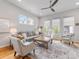 Bright living room with a comfortable seating area, hardwood floors, and a stylish rug at 933 E 36Th St, Charlotte, NC 28205