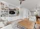 Stylish living room with built-in shelving, hardwood floors, and an open layout at 933 E 36Th St, Charlotte, NC 28205