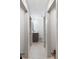 Hallway with multiple entrances and a glimpse of a bathroom vanity at 10016 Morgan Mill Rd, Monroe, NC 28110